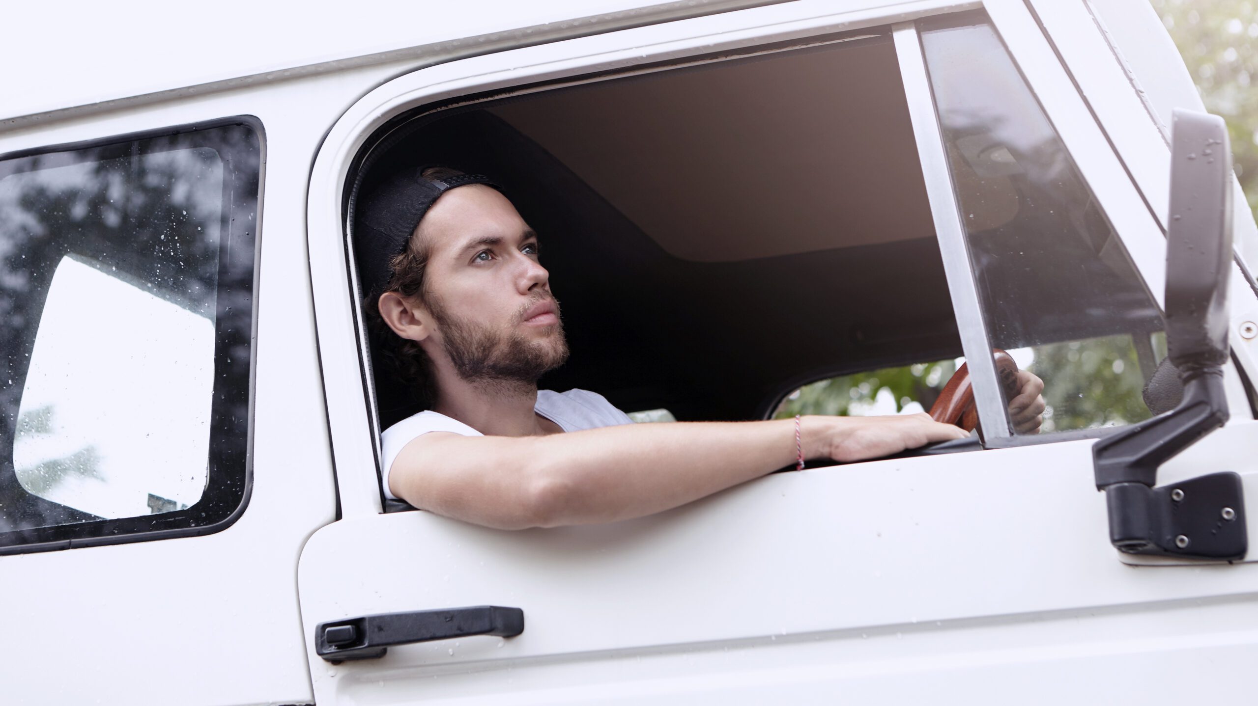 Driver sitting in van window during Yorkshire same-day courier route